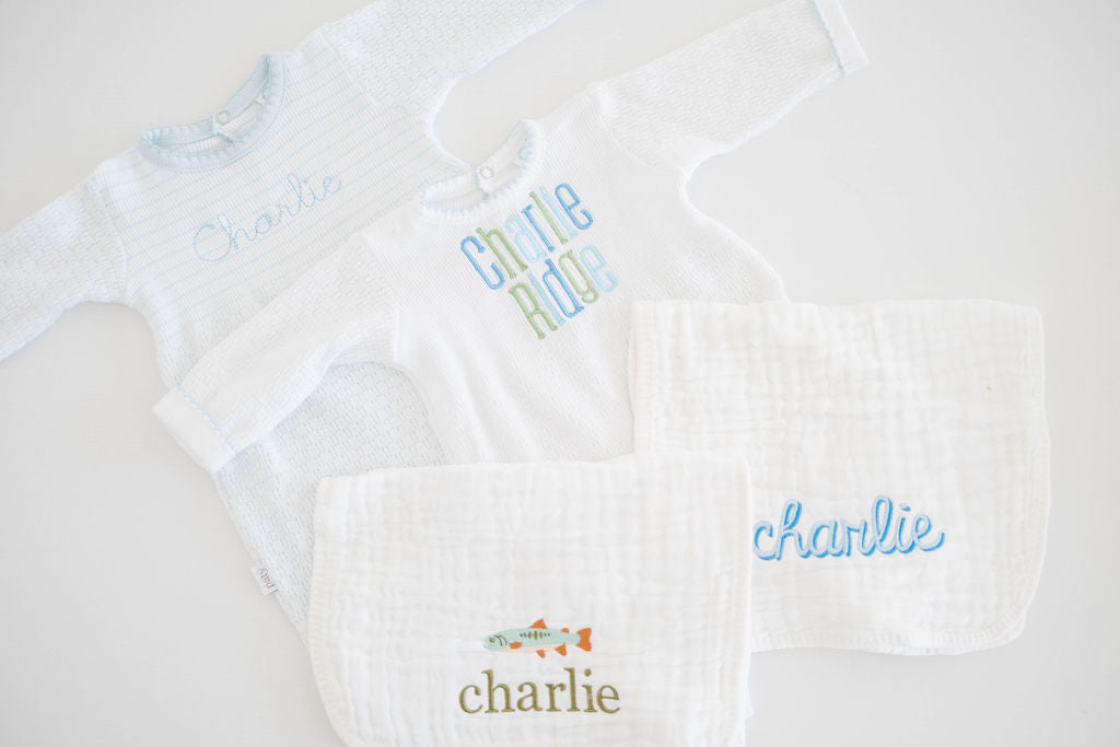 Baby Bundle Medium: two outfits and two muslin burp cloths embroidered with Charlie