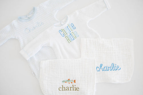 Baby Bundle Medium: two outfits and two muslin burp cloths embroidered with Charlie
